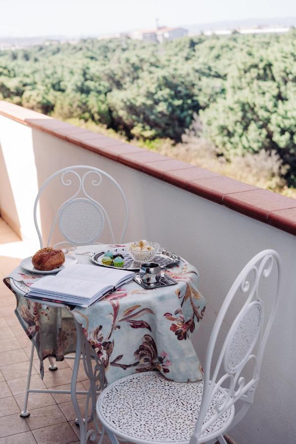 Juniper Bay Bed and Breakfast Portoscuso Buitenkant foto